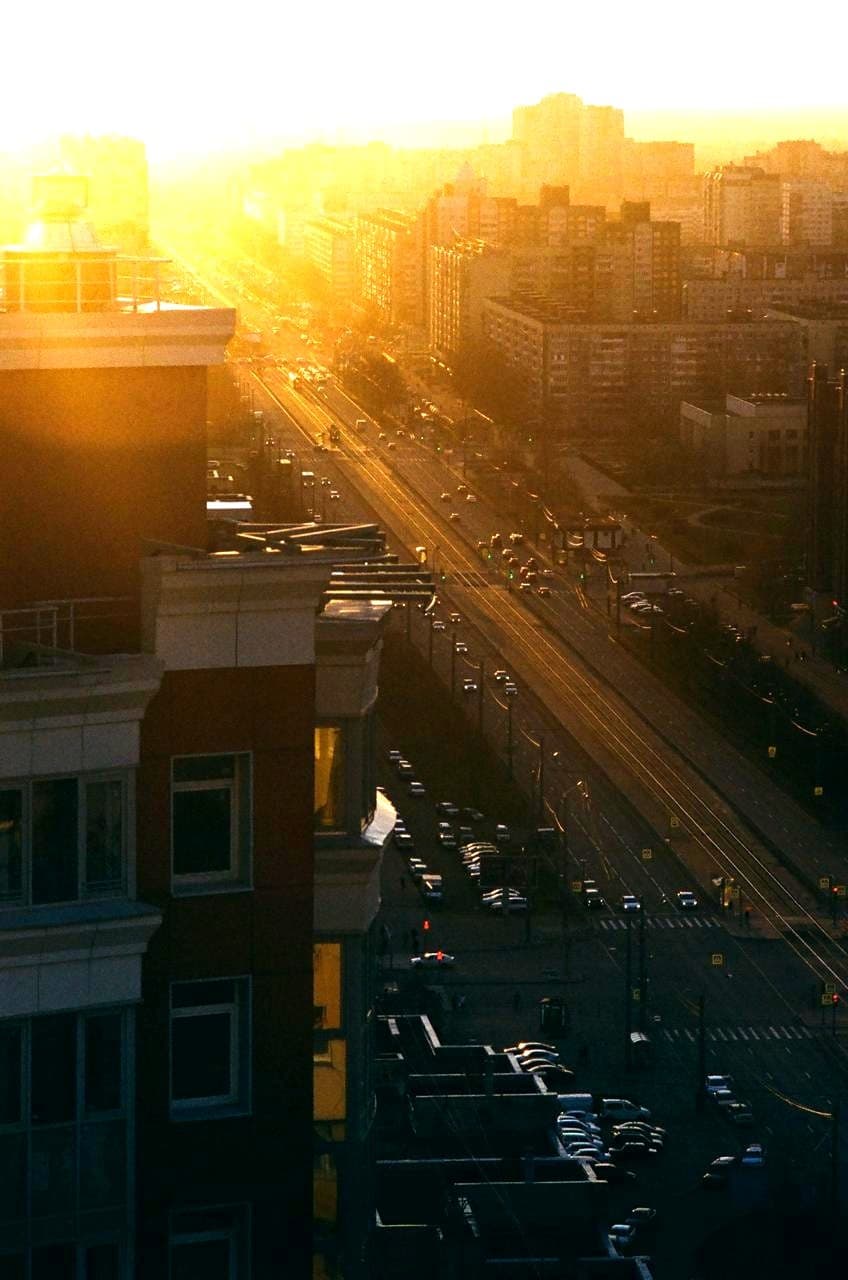 City street bathed in golden sunset light