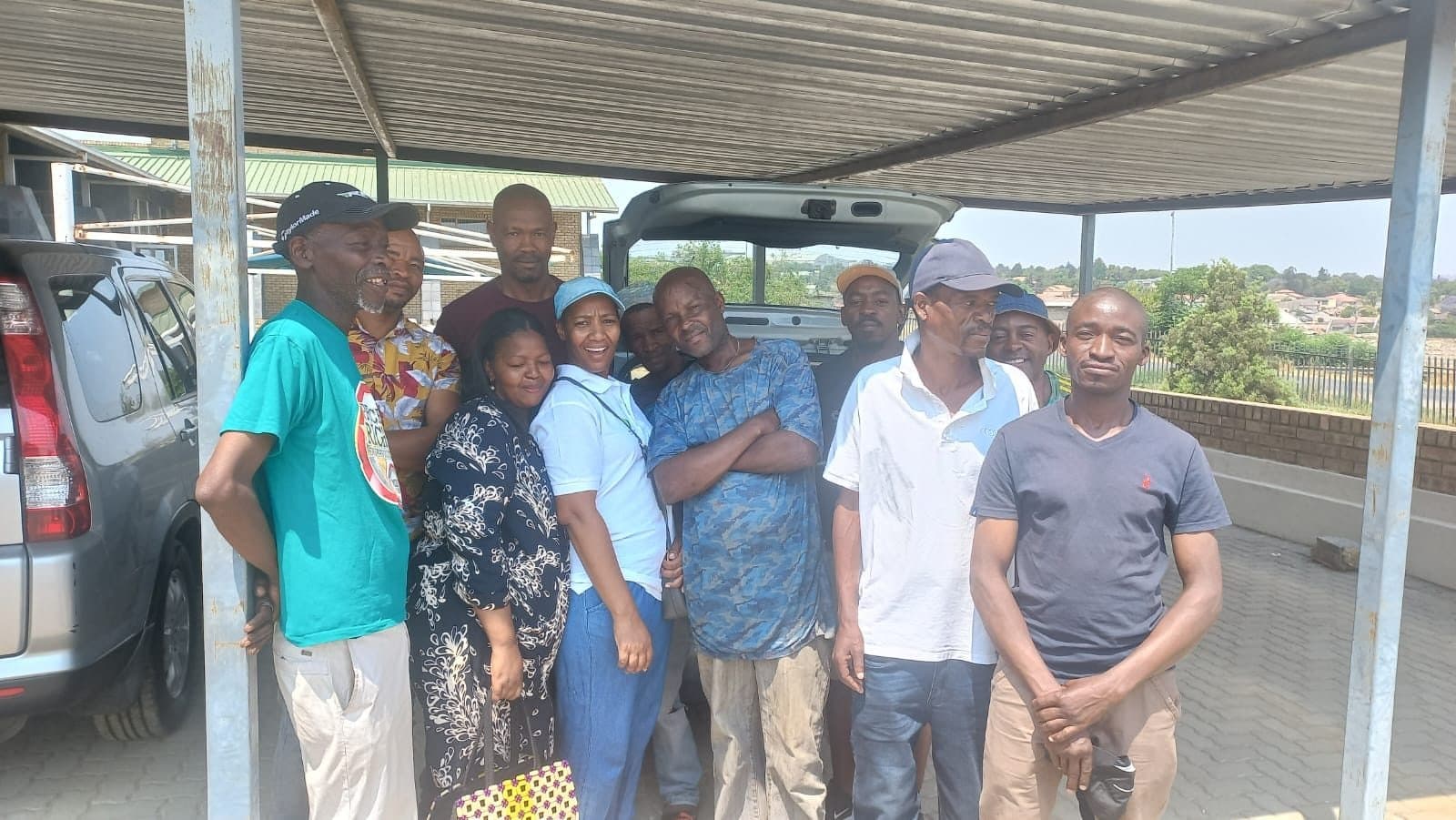 LTBL team and community members together after a site visit