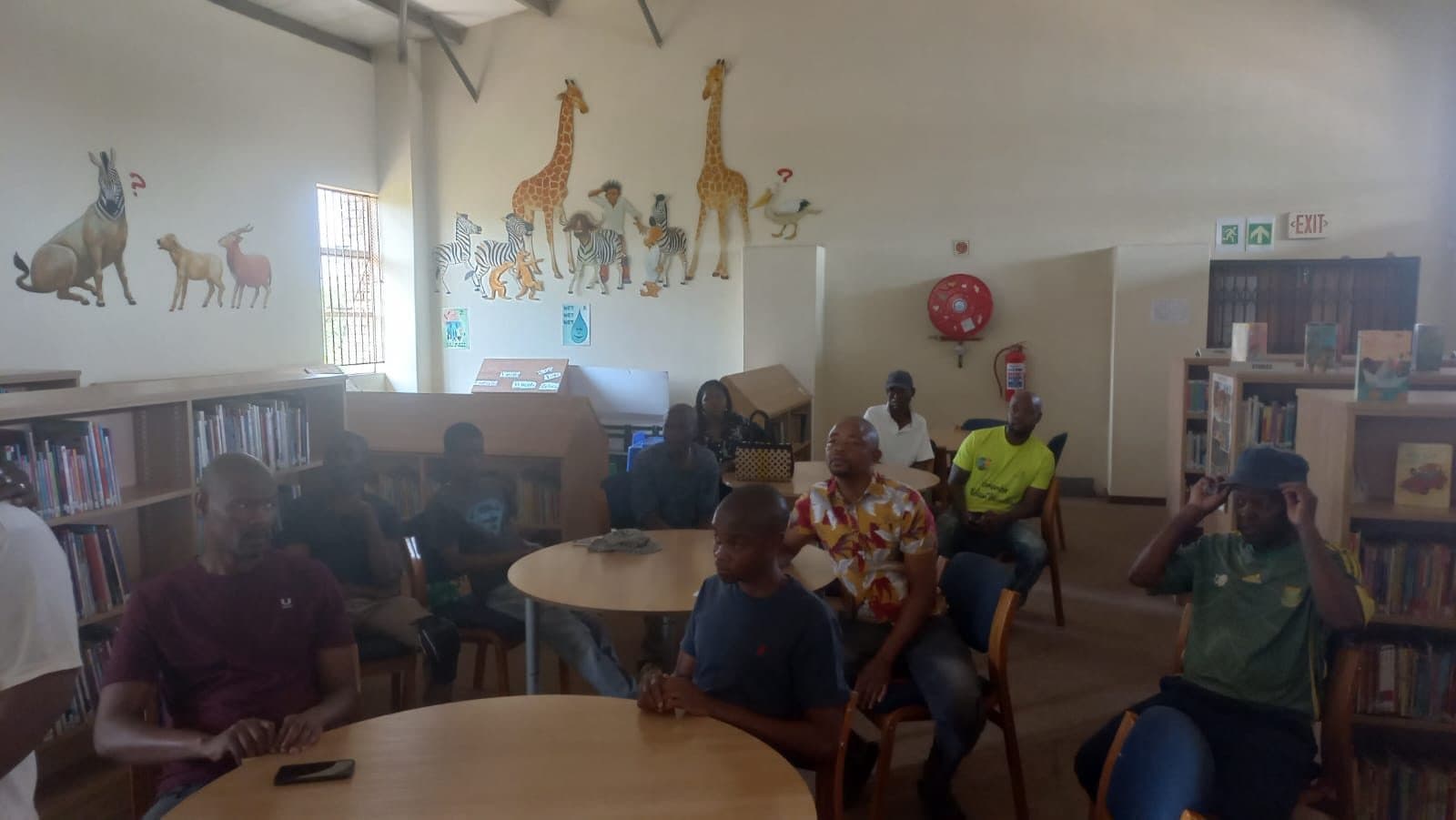 Community members attending an LTBL training workshop